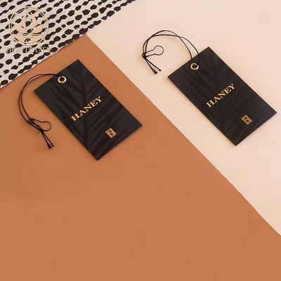 黒色 彫刻された衣料品のラベル エコフレンドリー 贅沢 プリントされたカスタムラベル 衣料品のラベル