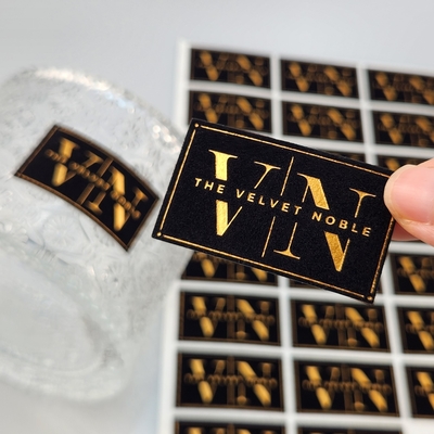 購入 High Quality Customized Embossed UV Gold Foil Printing Card Press Gold Art Paper Velvet Gold Stamping Label Sticker for Perfume & Party  online manufacture