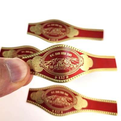 購入 Custom Round Rectangular Oval Cigar Band Label with Gold Foil Stamping and Embossed Design online manufacture